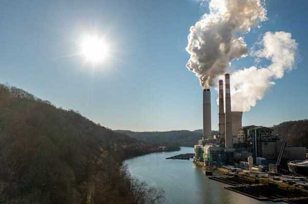 Power plant beside a river and forest