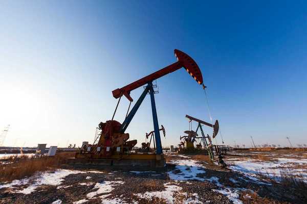 Pumpjacks at work in western oilfields