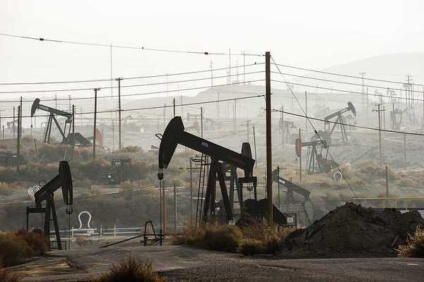 Pumpjacks extract oil from an oilfield in Kern County, CA, using hydraulic fracturing