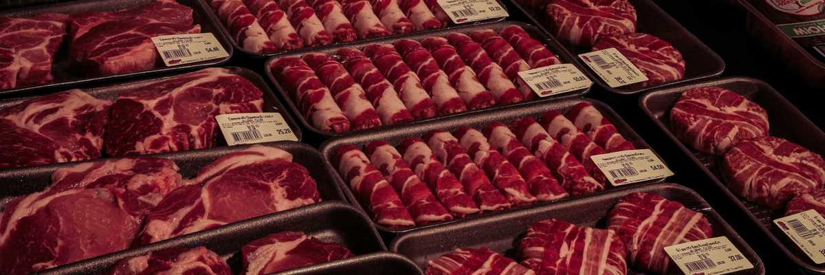 raw meat in clear plastic packs