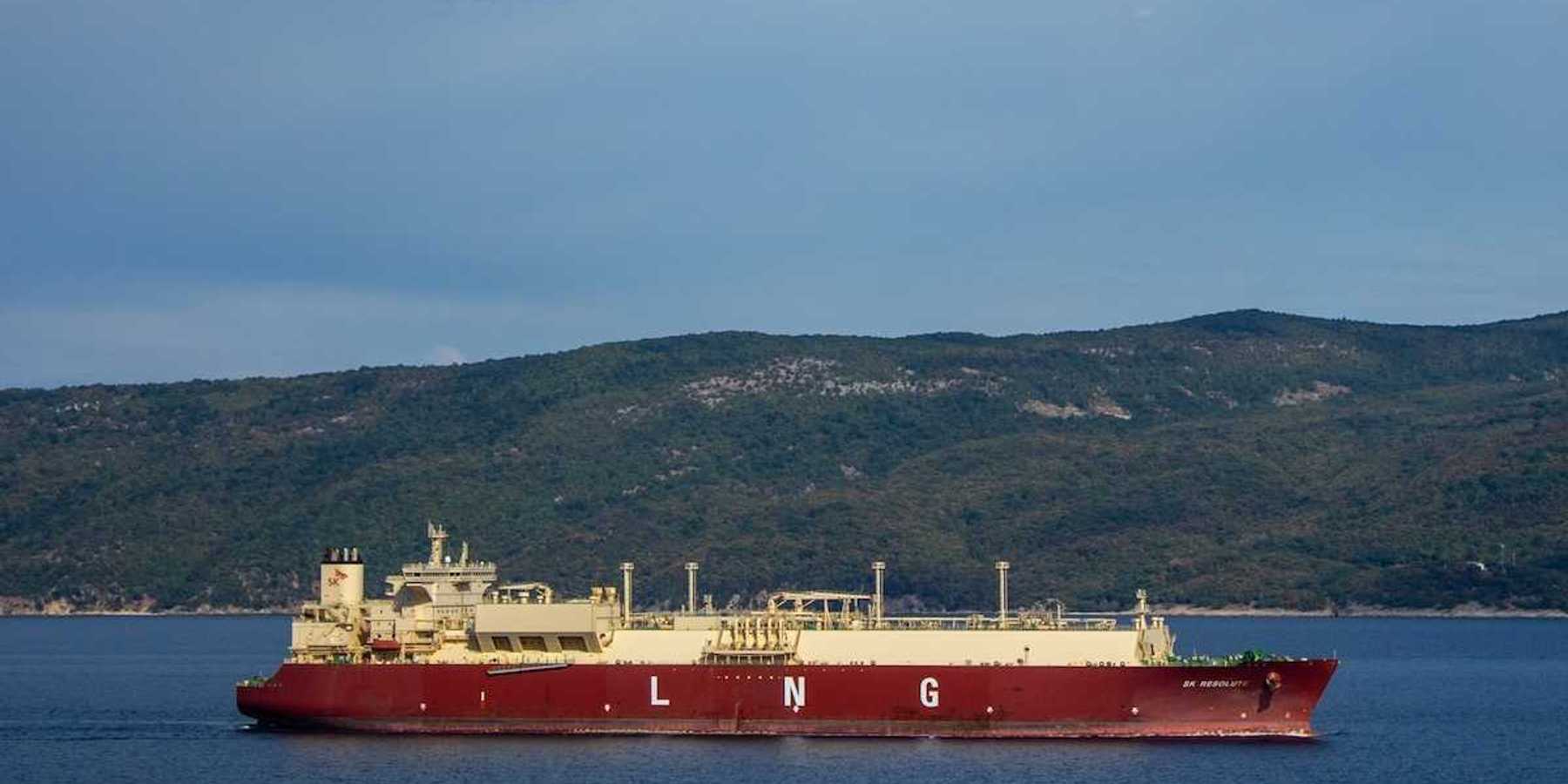 Red and white tanker with "LNG" printed on the side.