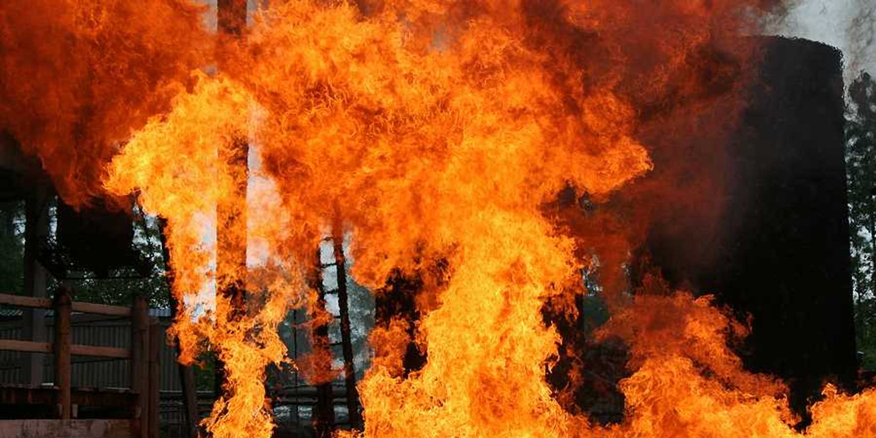 Refinery explosion and subsequent fire