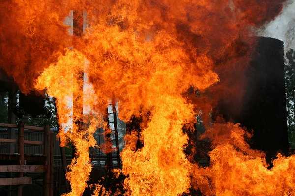 Refinery explosion and subsequent fire