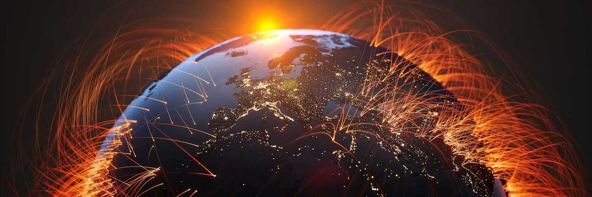Rendering of planet earth depicting energy pathways against a setting or rising sun