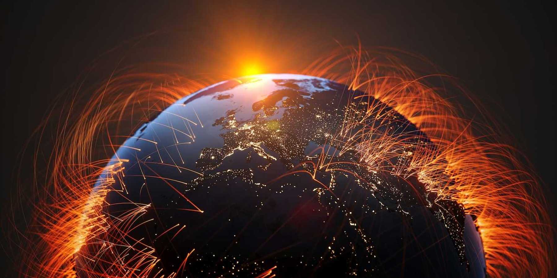 Rendering of planet earth depicting energy pathways against a setting or rising sun