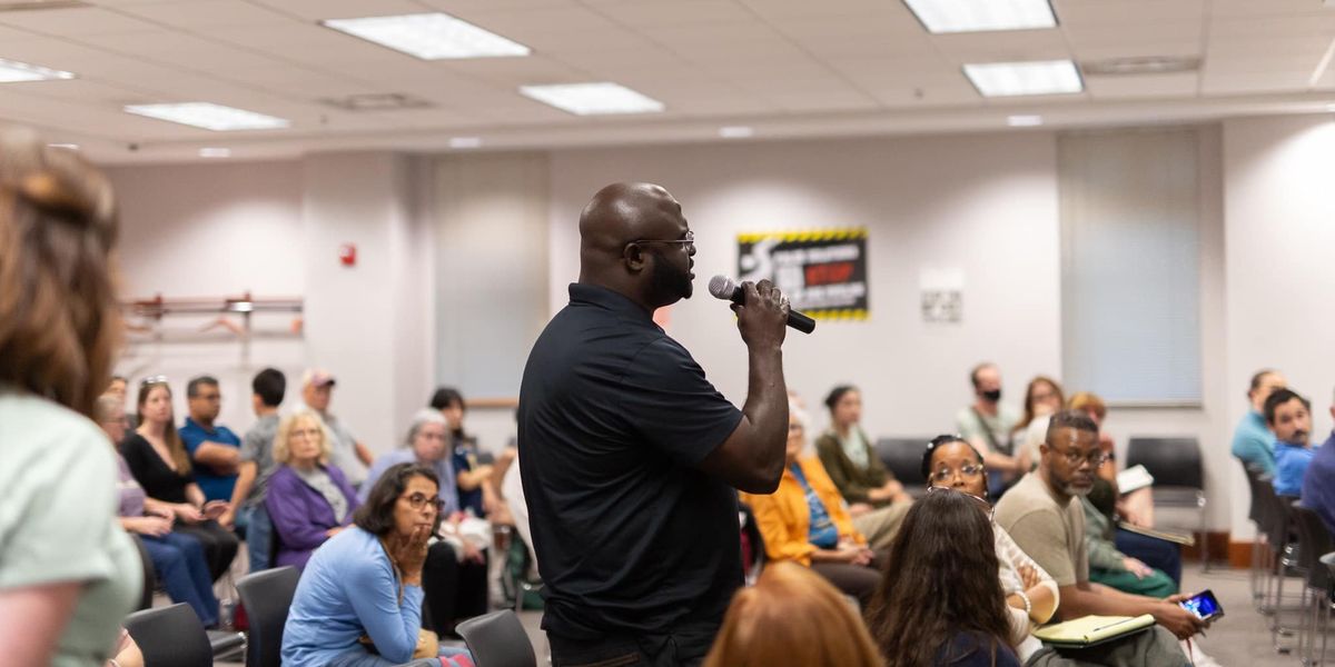 Resident speaks at an event about the Midwest hydrogen hub organized by Just Transition NWI.