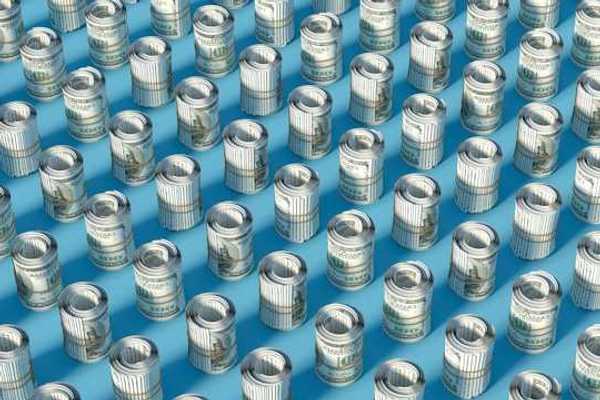 Rows of rolled up hundred-dollar U.S. bills on a blue surface