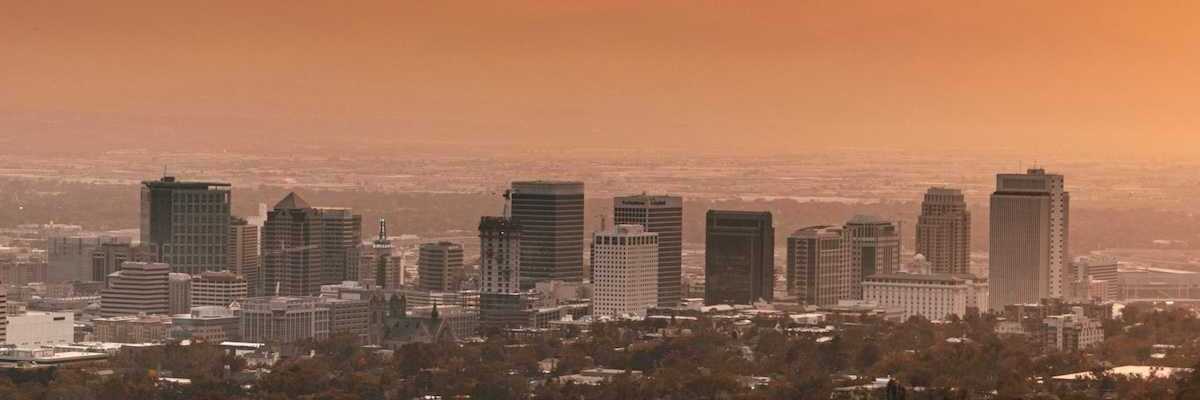 Salt Lake City center beneath a hazy sky