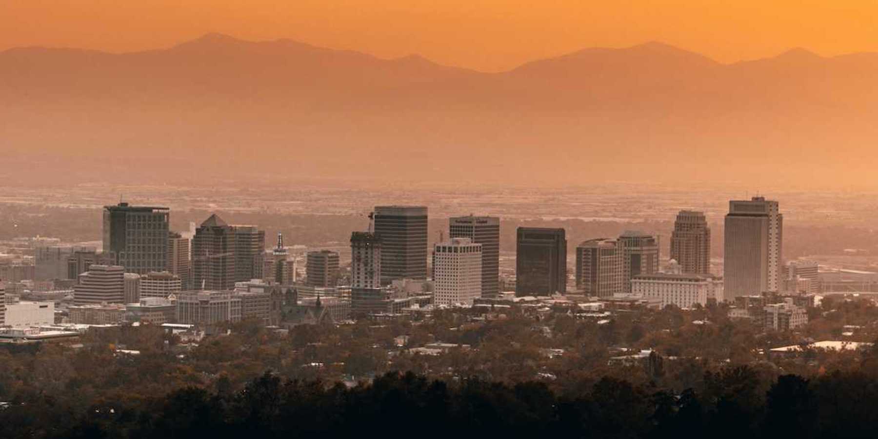 Salt Lake City center beneath a hazy sky
