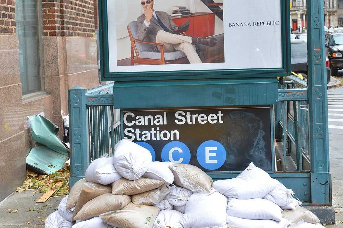 Sandbags piled at entrance to Canal Street Subway station NYC as a result of of Hurricane Sandy