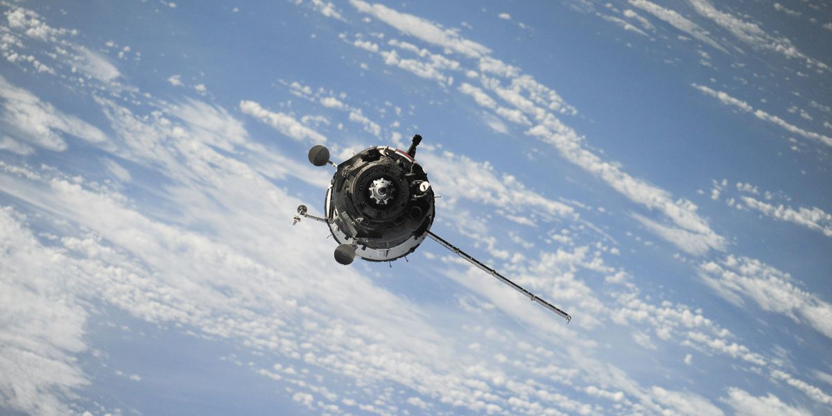 satellite flying in space.