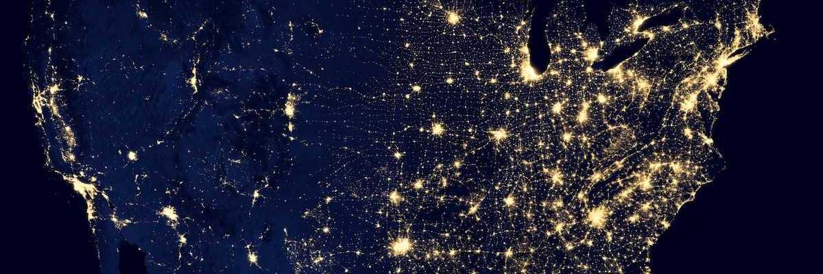 Satellite map of the continental US taken at night showing lights from major metropolitan areas