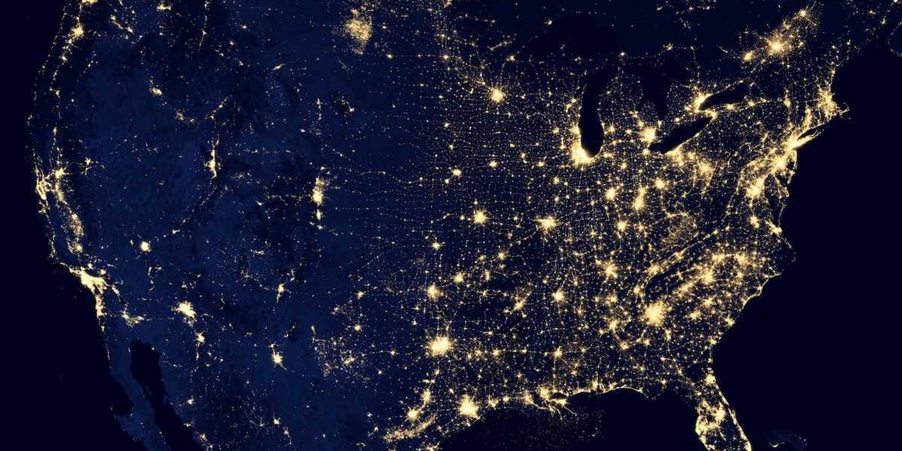 Satellite map of the continental US taken at night showing lights from major metropolitan areas
