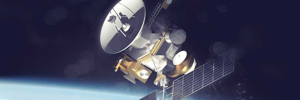 satellite with solar panels deployed over Earth