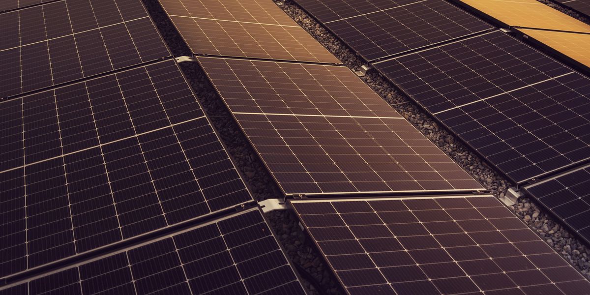 several rows of solar panels on a roof