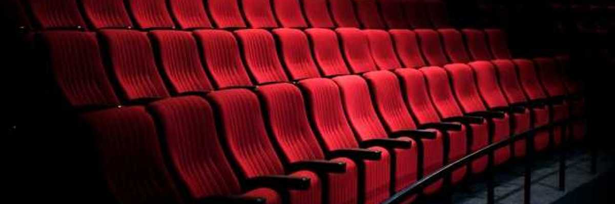 Side view of red seats at a movie theater