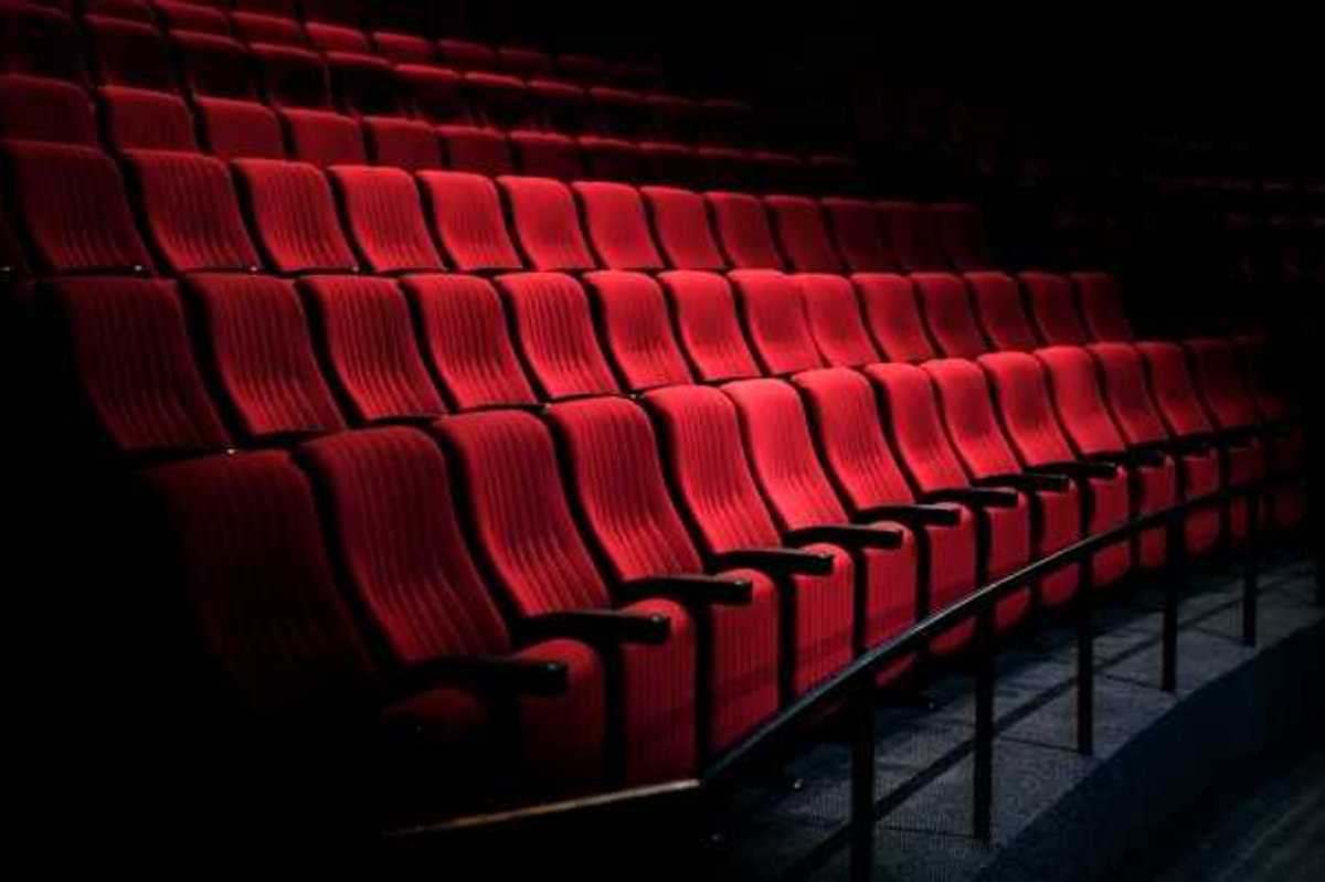 Side view of red seats at a movie theater