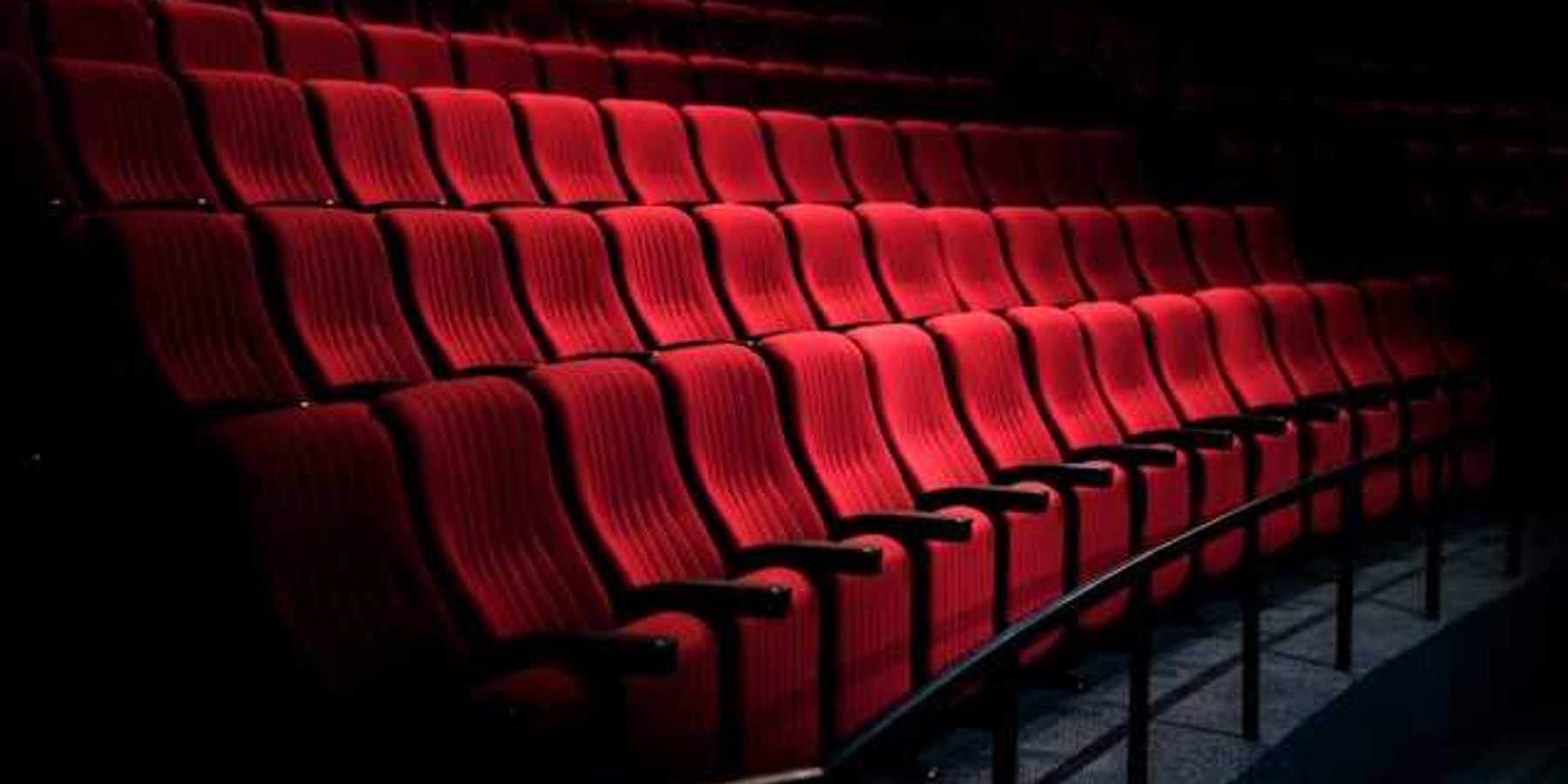 Side view of red seats at a movie theater