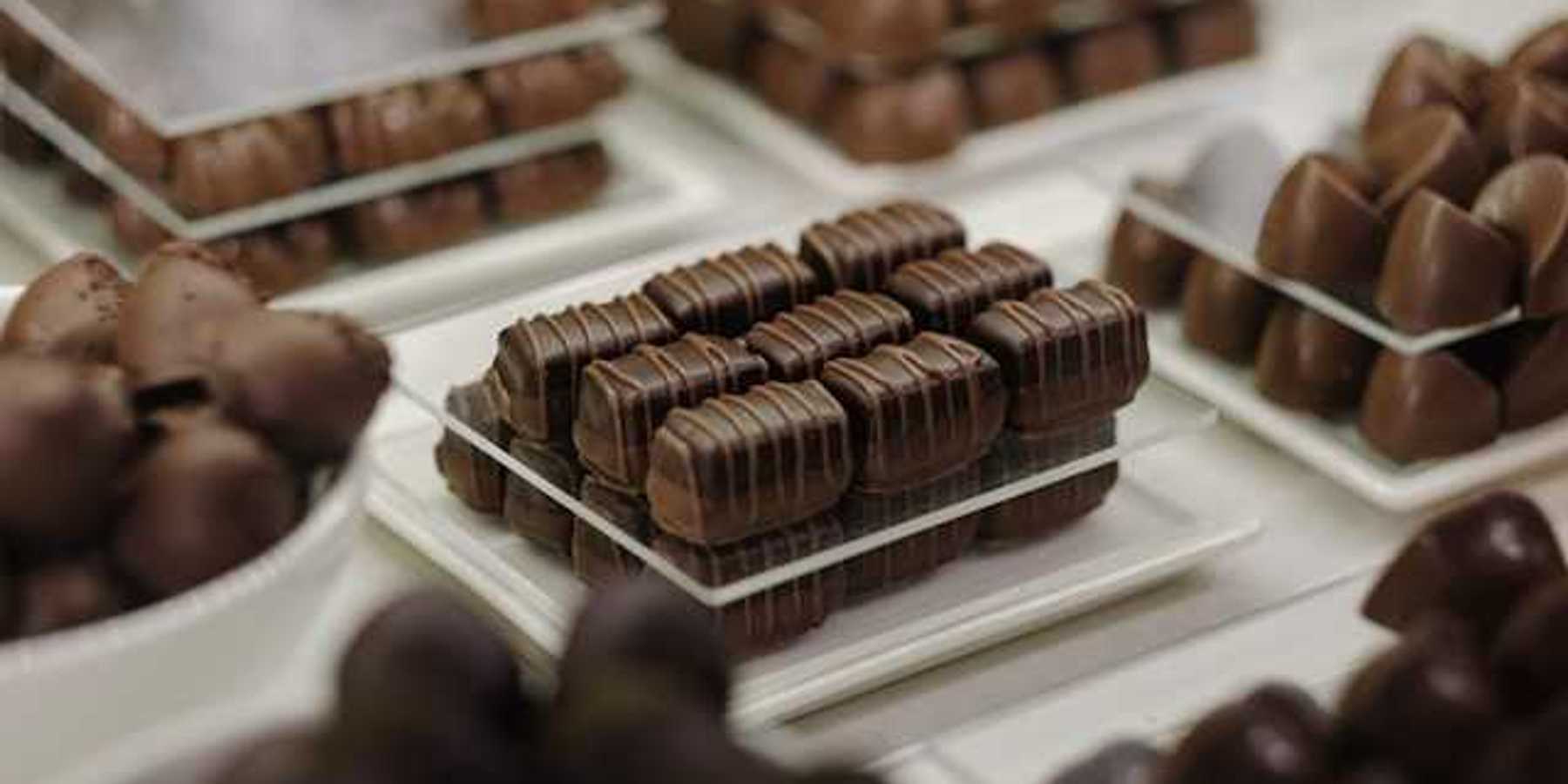Small plates with different types of chocolate