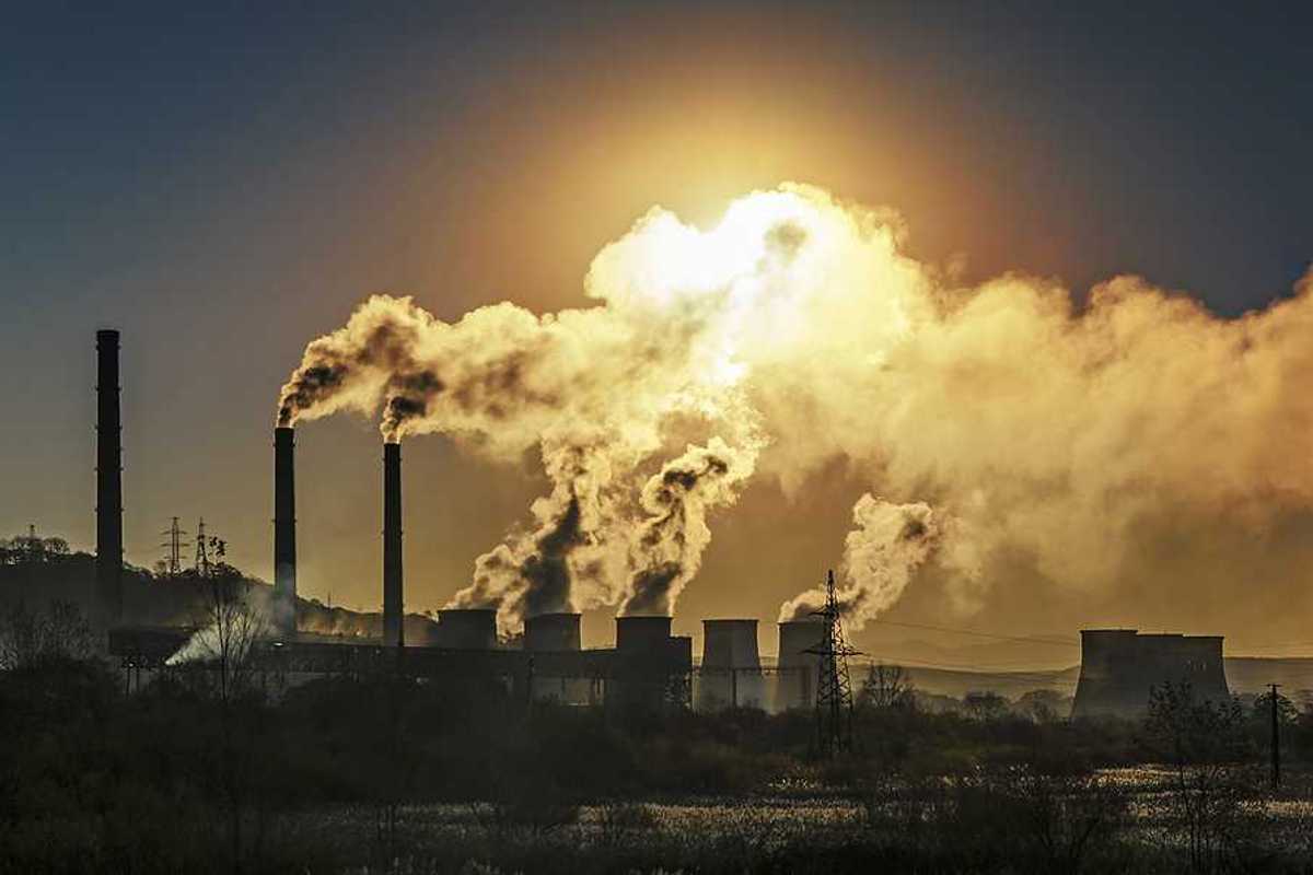 Smokestacks spewing air pollution from a power plant