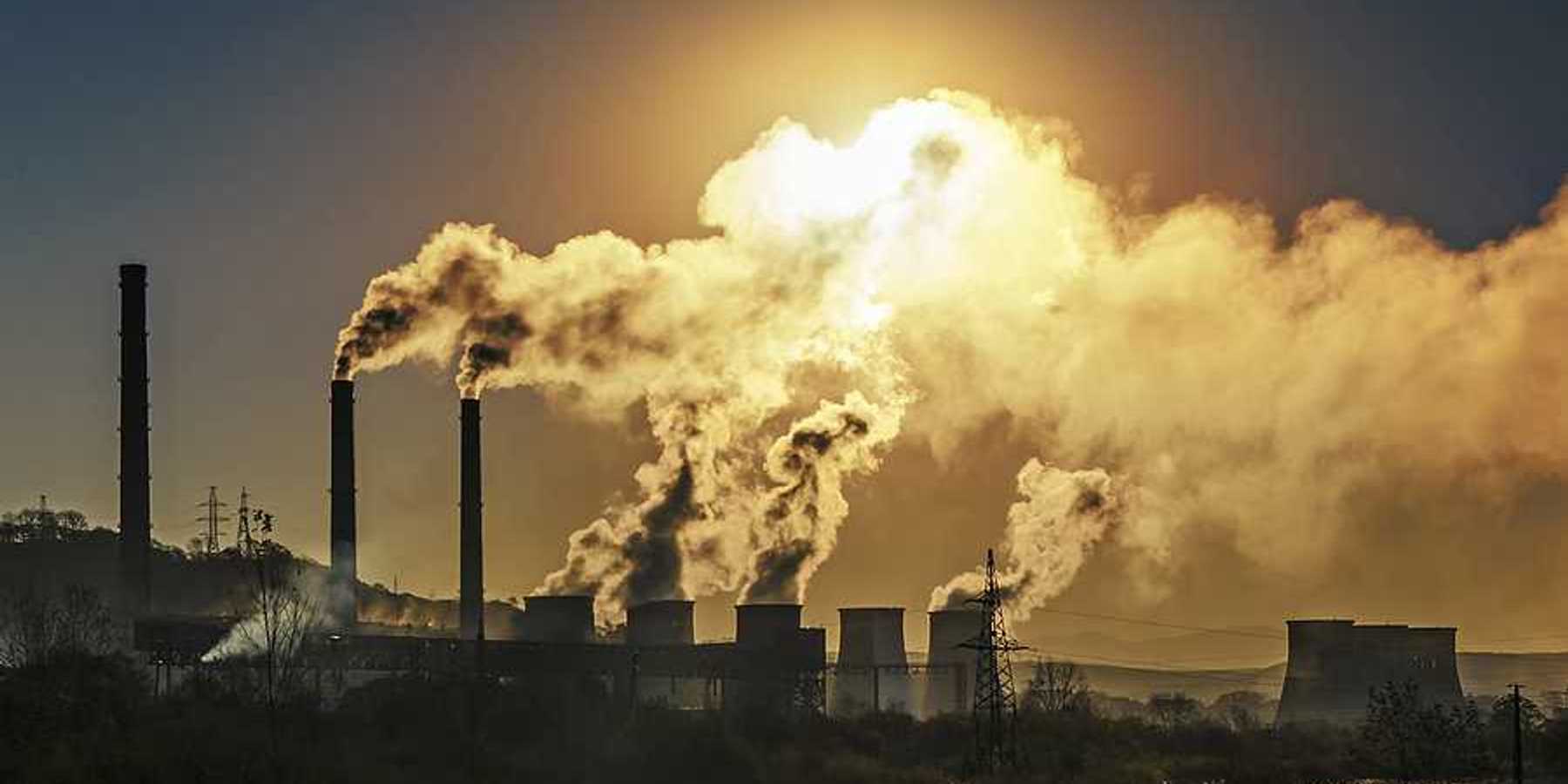 Smokestacks spewing air pollution from a power plant