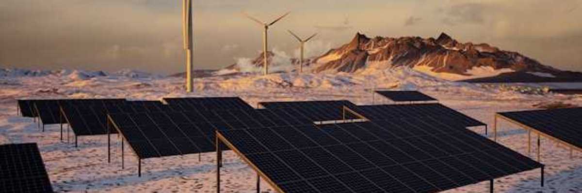 Solar panels and wind turbines in a snowy landscape