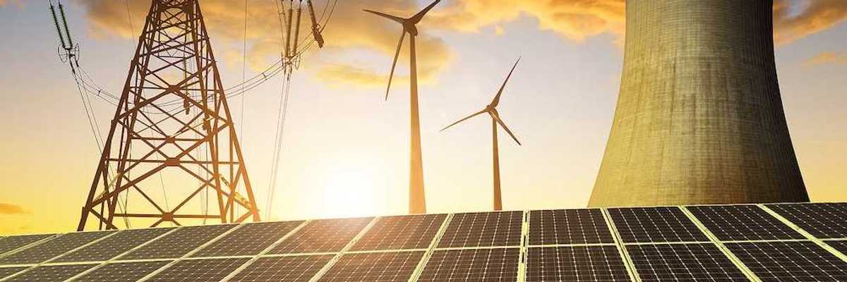 Solar panels in the background nuclear power plant, wind turbines and electricity pylon at sunset.