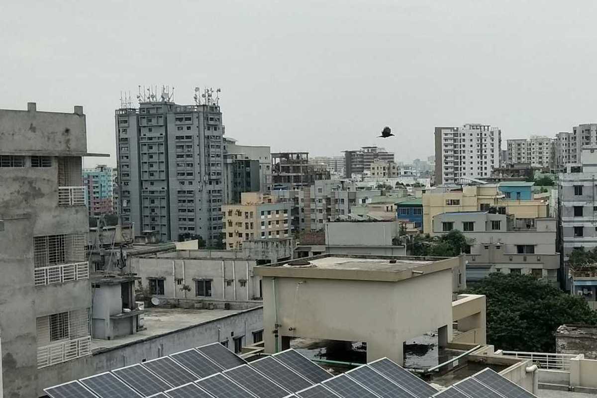 Solar panels on Bangladeshi city rooftop in Dhaka