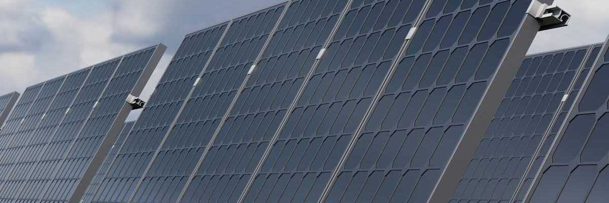 Solar panels under a cloudy sky