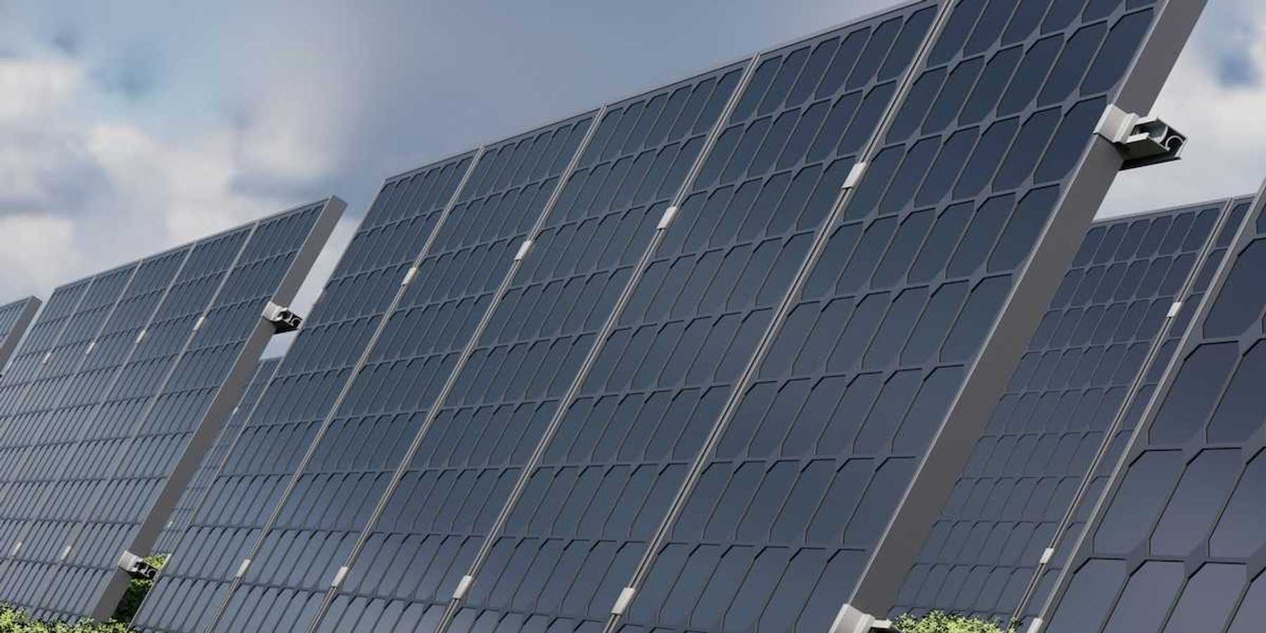 Solar panels under a cloudy sky