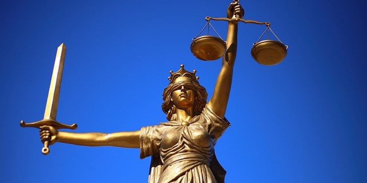 statue of lady justice with scales and sword