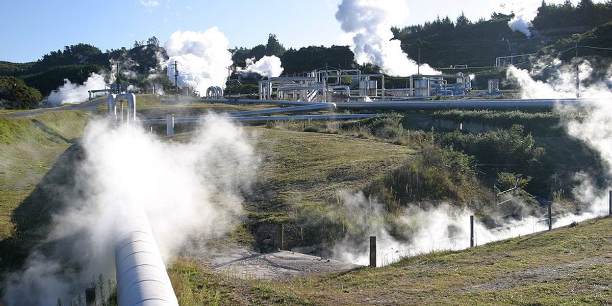 steam or smoke coming out of various pipes