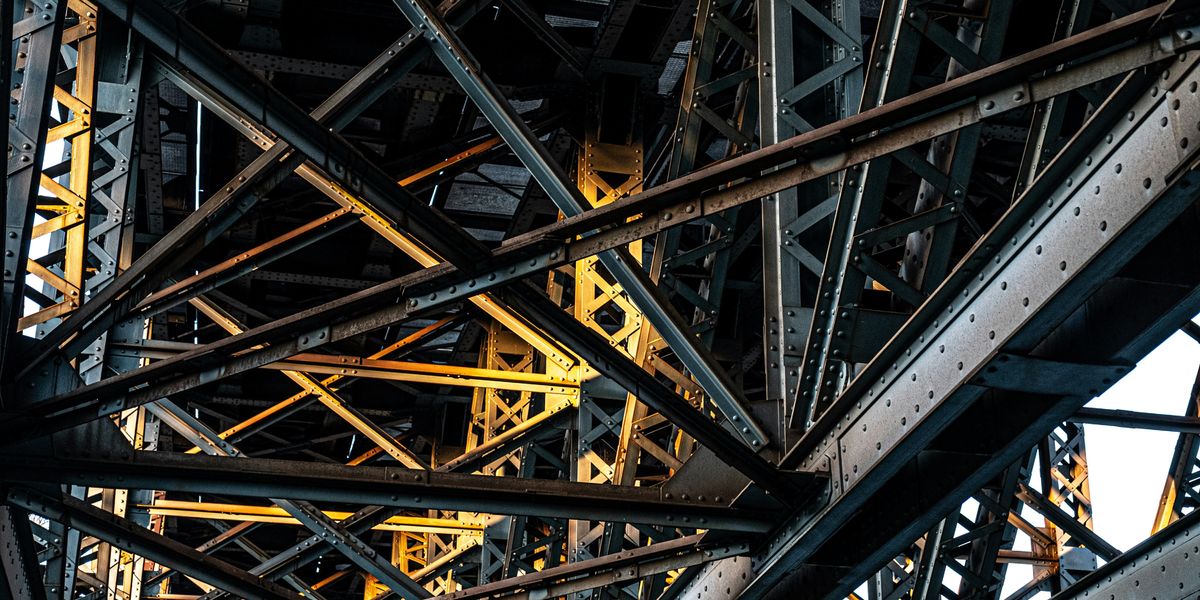 Steel beams supporting a large structure.