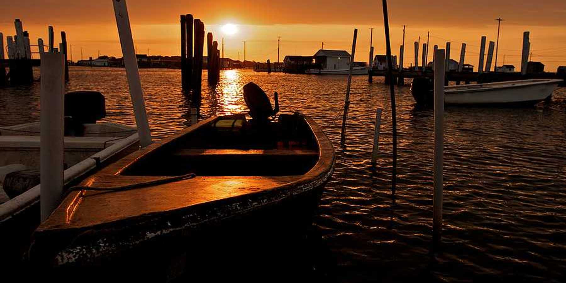 Sunrise over the fishing boats of Tangier Island in Virginia.