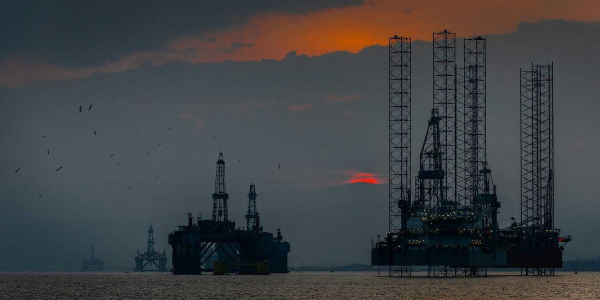 Sunset over the Cromarty Firth and North Sea oil platforms
