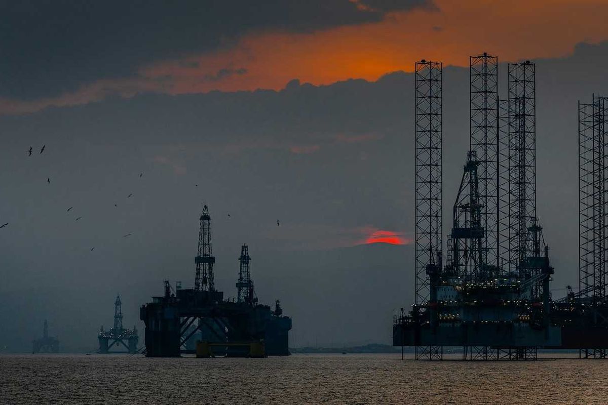 Sunset over the Cromarty Firth and North Sea oil platforms