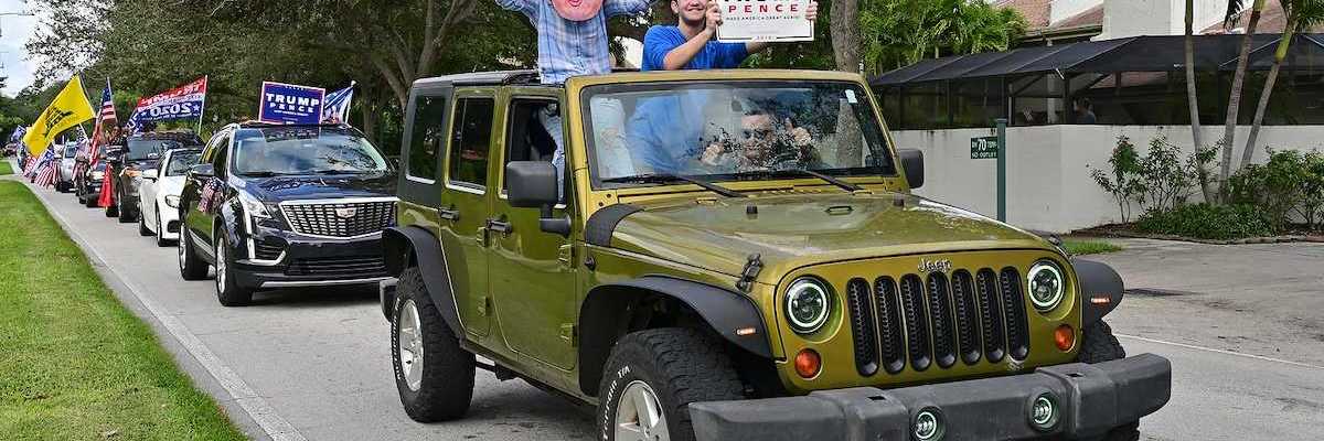 Supporters of President Donald Trump parade in cars and trucks in Miami, Florida