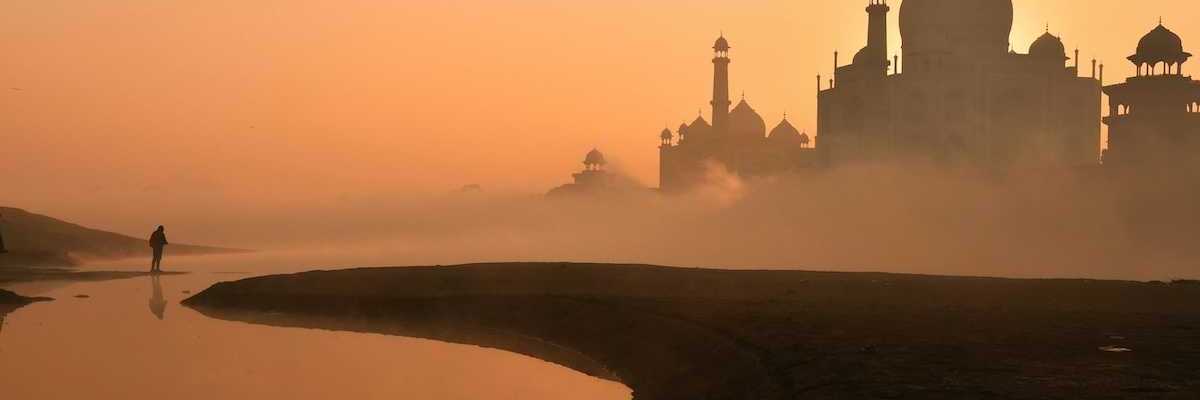 Taj Mahal against a hazy sunrise