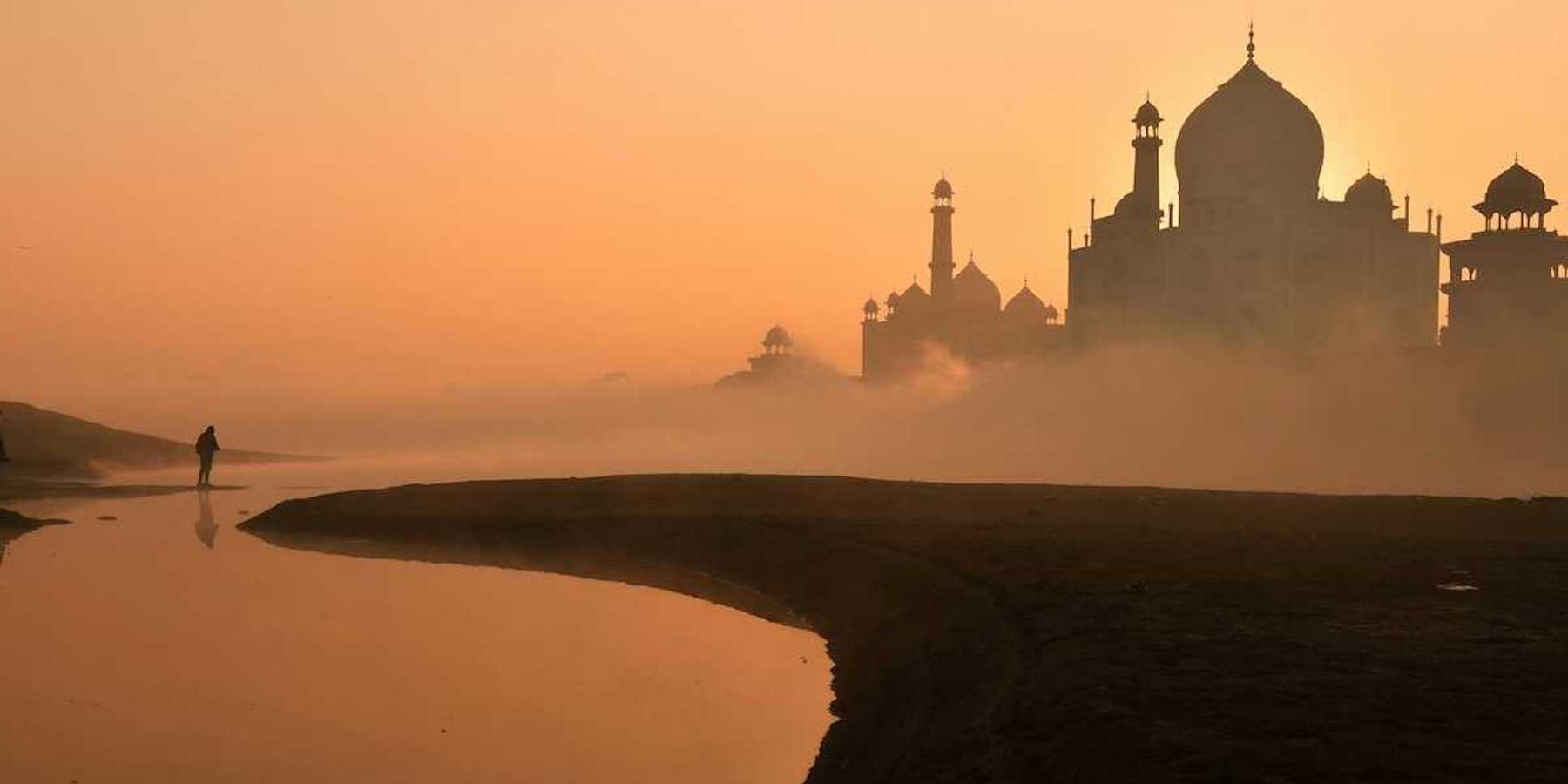 Taj Mahal against a hazy sunrise
