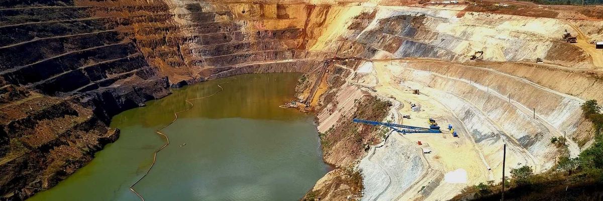 Terraced copper mine partially filled with water