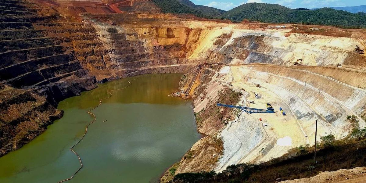 Terraced copper mine partially filled with water
