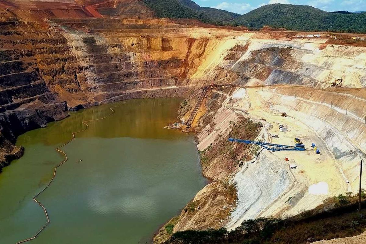 Terraced copper mine partially filled with water