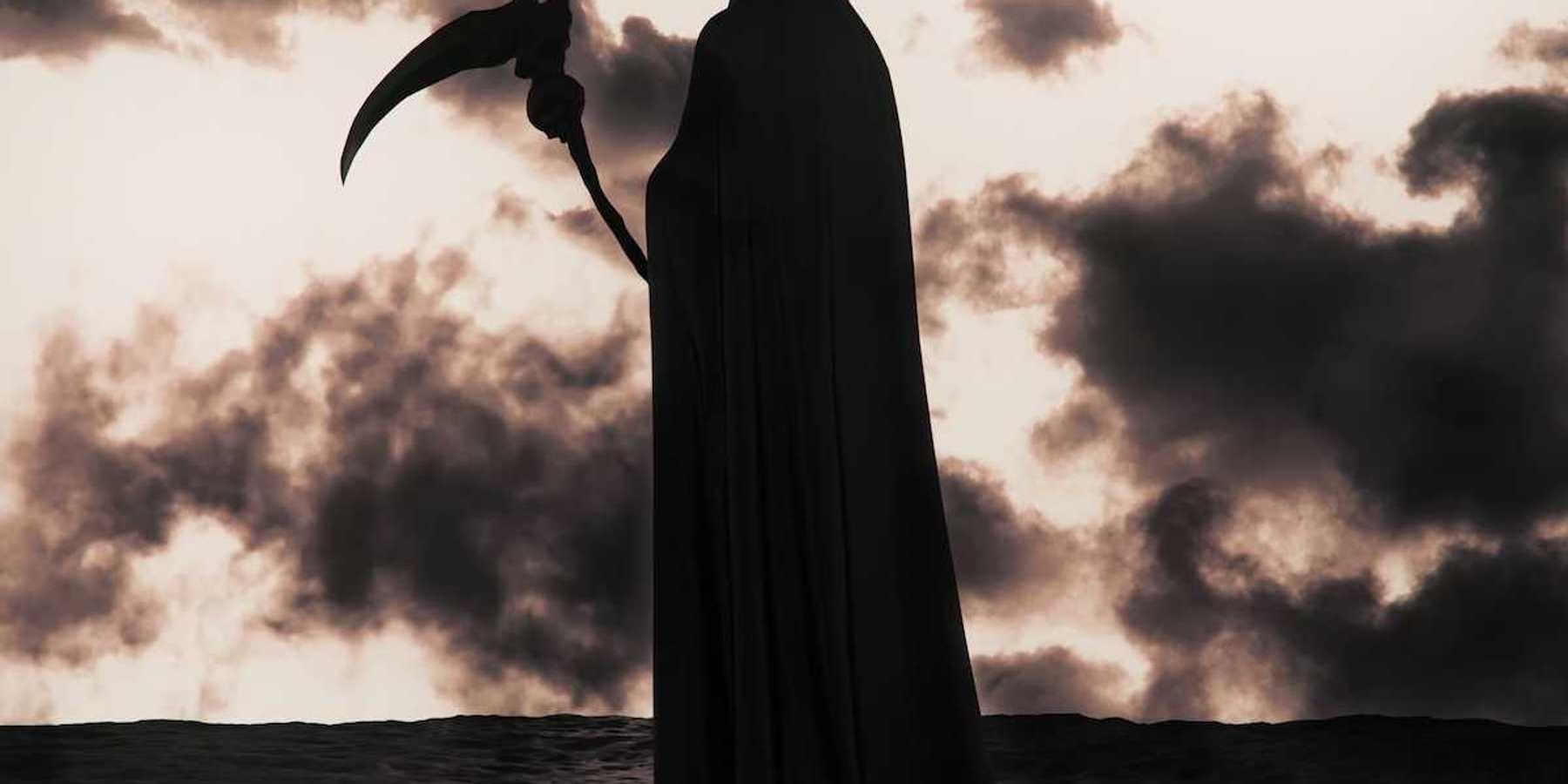 The Grim Reaper silhouetted against apocalyptic background