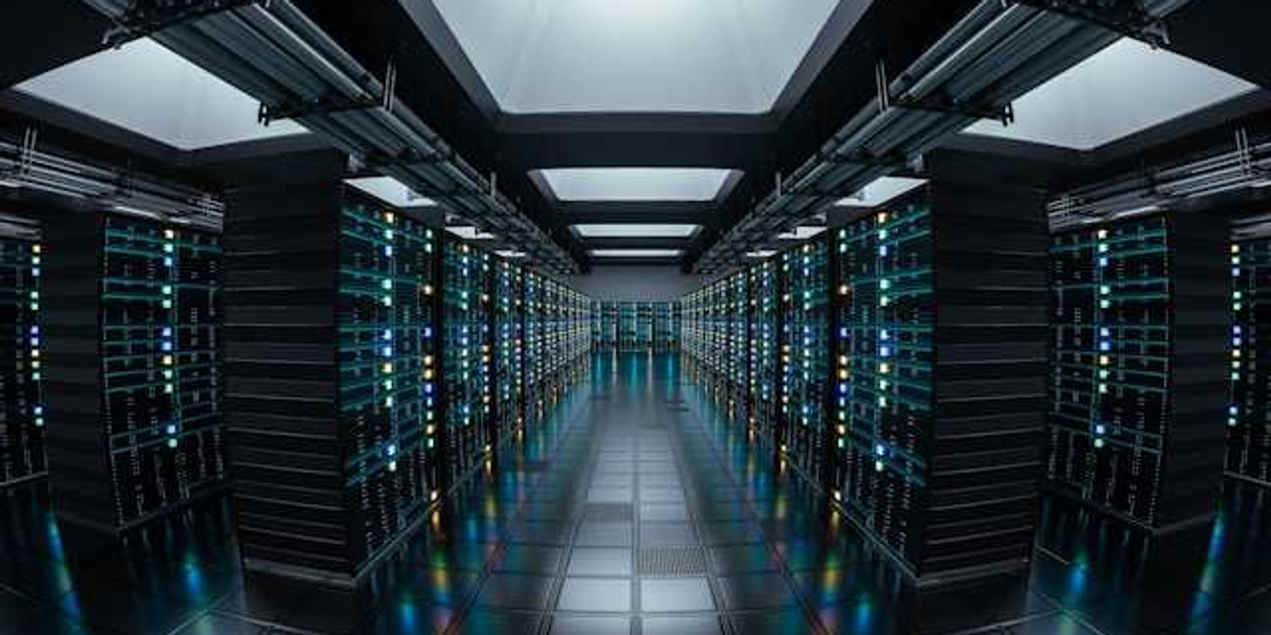 The interior of a data center with rows of servers stretching into the distance