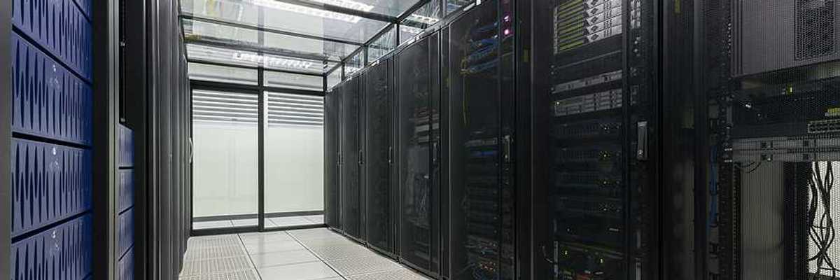 The interior of a data center with rows of servers