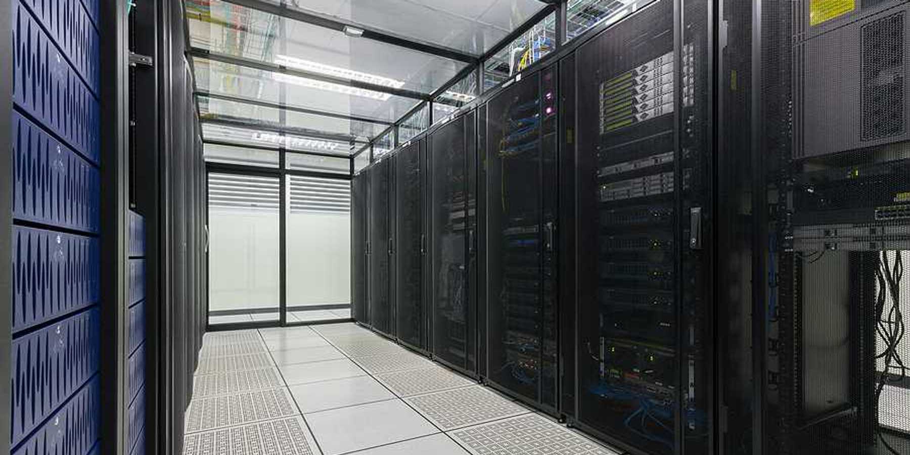 The interior of a data center with rows of servers
