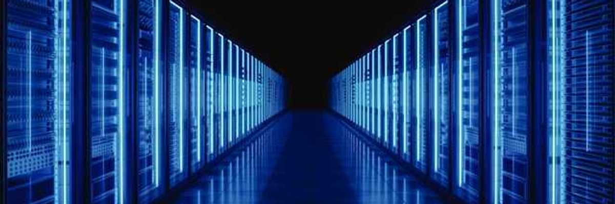 The interior of a data center with servers stretching into the distance