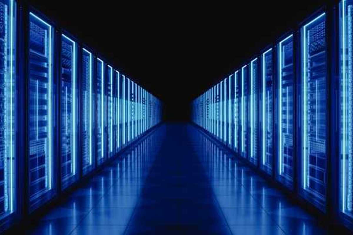 The interior of a data center with servers stretching into the distance