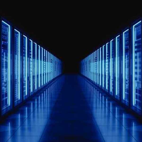 The interior of a data center with servers stretching into the distance