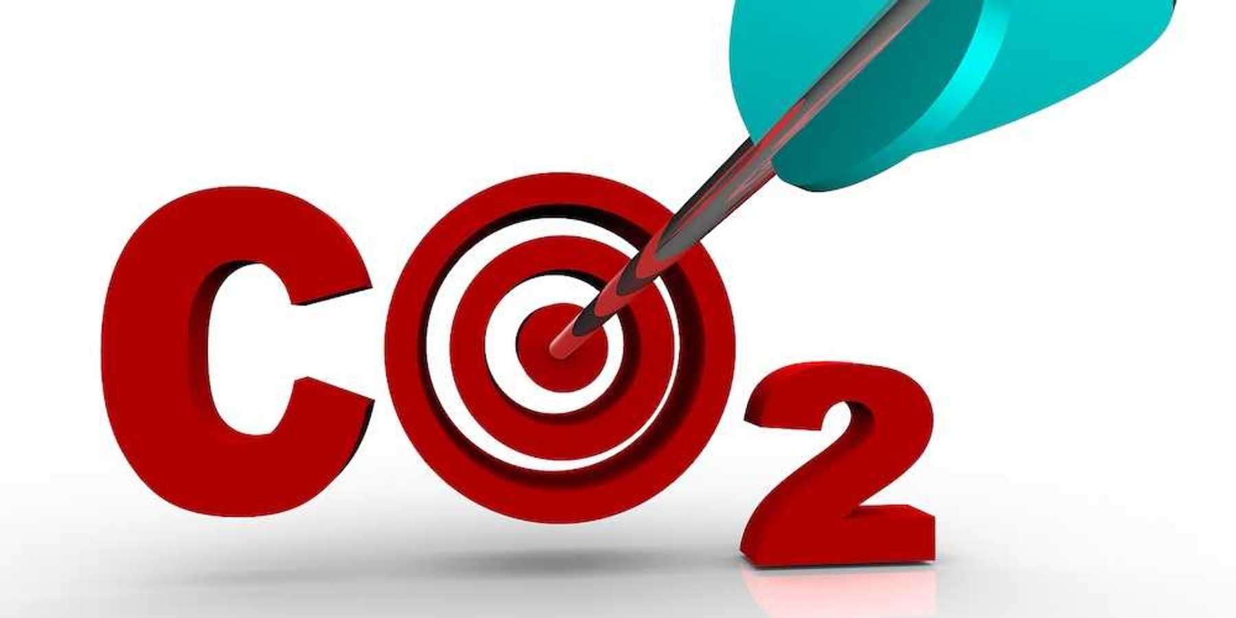 The letters CO2 representing Carbon Dioxide with a target bulls-eye in place of the O and an arrow hitting the middle of it, symbolizing a successful reduction of the harmful greenhouse gas